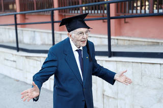 The Wider Image: Meet Italy's oldest student, surviving WW2 and a pandemic to graduate at 96
