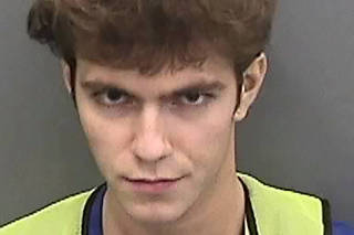 Graham Ivan Clark, 17, poses for a booking photo at Hillsborough County Jail in Tampa