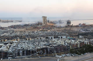 A general view shows the aftermath at the site of Tuesday's blast in Beirut's port area