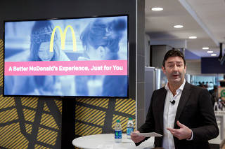 FILE PHOTO: McDonald's CEO Steve Easterbrook speaks during a press conference in New York