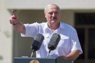 Belarusian President Lukashenko delivers a speech during a rally of his supporters in Minsk