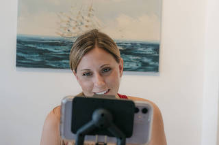 Katie Hill, the former Congresswoman from California, records the first episode of her new podcast, ?Naked Politics With Katie Hill,? in her home in Washington, on July 23, 2020. (Justin T. Gellerson/The New York Times)