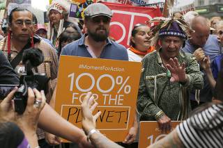 Leonardo DiCaprio takes part in a march against climate change in New York