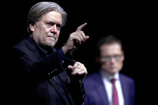 FILE PHOTO: Former White House Chief Strategist Steve Bannon gestures as he speaks during a conference of Swiss weekly magazine Die Weltwoche in Zurich