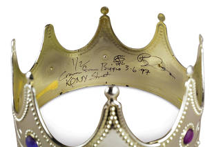 The signed plastic crown worn by rapper Notorious B.I.G. for the photoshoot titled 'Notorious B.I.G as the K.O.N.Y'
