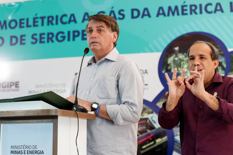Presidente Jair Bolsonaro (PL) e o intérprete Fabiano Guimarães