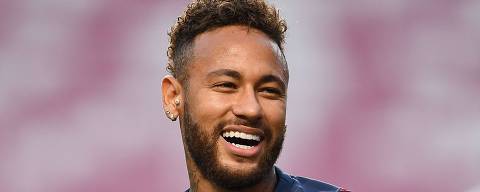 Paris Saint-Germain's Brazilian forward Neymar laughs during a training session at the Luz stadium in Lisbon on August 22, 2020 on the eve of the UEFA Champions League final football match between Paris Saint-Germain and Bayern Munich. (Photo by David Ramos / various sources / AFP)