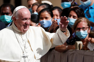 Pope Francis leaves after the first weekly general audience to readmit the public since the coronavirus disease (COVID-19) outbreak, at the Vatican