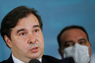 President of Brazil's Lower House Rodrigo Maia speaks next to Government Secretary Jorge Antonio de Oliveira Francisco during a news conference after receiving the administrative reform bill at the National Congress in Brasilia