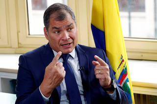 FILE PHOTO: Ecuador's former president Correa speaks during an interview with Reuters in Brussels