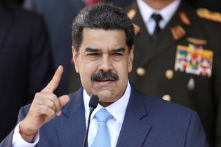 FILE PHOTO: FILE PHOTO: Venezuela's President Maduro holds a news conference at Miraflores Palace in Caracas