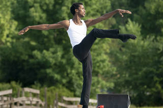 Calvin Royal III, who curated the first weekend?s programs for the Kaatsbaan Summer Festival, in his dance ?The Dividing Line,? during the festival in Tivoli, N.Y., Aug. 1, 2020. (Sara Krulwich/The New York Times)