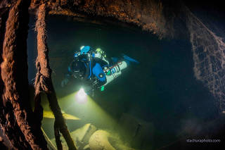 A diver checks the wreck of a German Second World War ship 