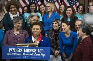 Rep. Barbara Lee (D-Calif.) introduces Rep. Alexandria Ocasio-Cortez (D-N.Y.) as House Democrats gathered for the unveiling of the Paycheck Fairness Act, a measure intended to equalize pay between men and women, on Capitol Hill.