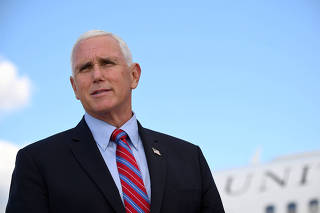 FILE PHOTO: FILE PHOTO: FILE PHOTO: U.S. Vice President Mike Pence departs for travel to the vice presidential debate in Salt Lake City, Utah, at Joint Base Andrews, Maryland