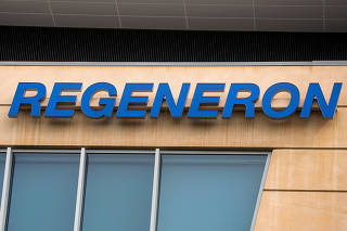 FILE PHOTO: The Regeneron Pharmaceuticals company logo is seen on a building at the company's Westchester campus in Tarrytown, New York