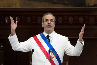 Dominican Republic's new President Luis Abinader gestures during the swearing-in ceremony at the Congress in Santo Domingo