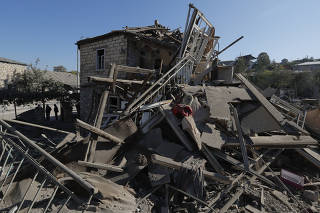 A view shows the ruins of a building following recent shelling during a military conflict over the breakaway region of Nagorno-Karabakh, in Stepanakert