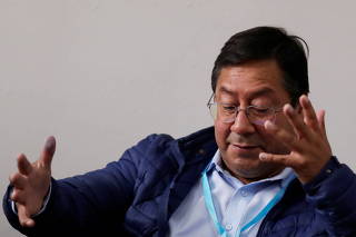 Luis Arce, presidential candidate of the Movement to Socialism party (MAS), gestures during a meeting with foreign journalists after voting in the presidential election in La Paz