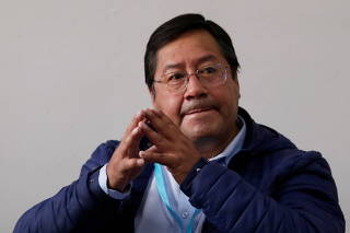 Luis Arce, presidential candidate of the Movement to Socialism party (MAS), gestures during a meeting with foreign journalists after voting in the presidential election in La Paz