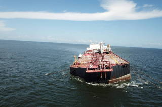 The Nabarima floating storage and offloading (FSO) facility is seen tilted in the Paria Gulf