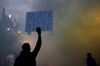 FILE PHOTO: Protesters rally against the death in Minneapolis police custody of George Floyd, in Seattle