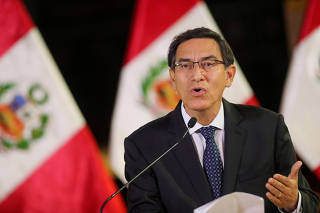 FILE PHOTO: Peru's President Vizcarra addresses the nation at the government palace in Lima