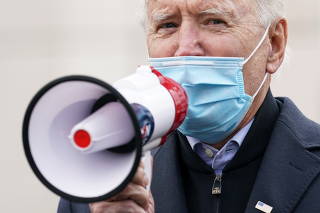 U.S. Democratic presidential nominee Joe Biden speaks through a megaphone during an event on Election Day in Scranton
