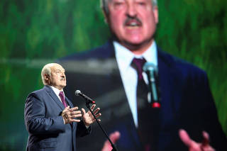 FILE PHOTO: Belarusian President Alexander Lukashenko speaks at an event in Minsk, Belarus