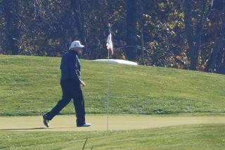 U.S. President Donald Trump plays golf at the Trump National Golf course shortly after news media declared U.S. Democratic presidential nominee Joe Biden the winner of the 2020 U.S. presidential election, in Sterling, Virginia