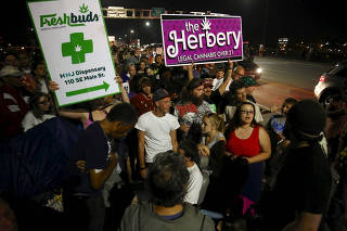 FILE PHOTO: Marijuana enthusiasts gather after midnight to celebrate the legalization of recreational use of marijuana in Portland, Oregon