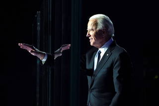 Democratic 2020 U.S. presidential nominee Joe Biden waves at his election rally in Wilmington