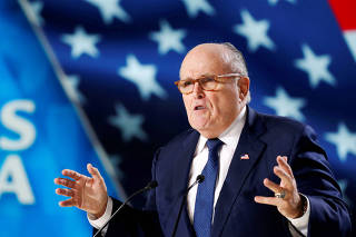 FILE PHOTO: Rudy Giuliani, former Mayor of New York City, delivers his speech as he attends the NCRI, meeting in Villepinte