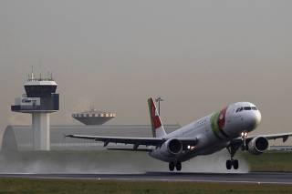 An Airbus jet of TAP Portugal airlines takes off in Lisbon airport