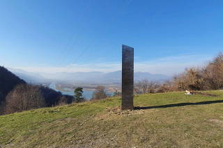 Metal monolith stands on the hills of Batca Doamnei, near Piatra Neamt