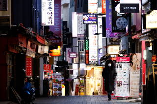 A previously crowded shopping street affected by heightened social distancing rules is pictured amid the coronavirus disease (COVID-19) pandemic in Seoul