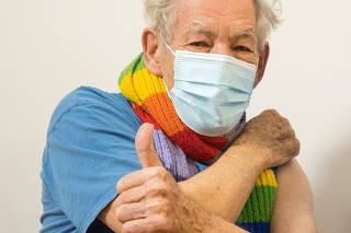 Actor Ian McKellen receives COVID-19 vaccine at Queen Mary University Hospital, in London