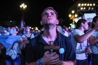 People react during an anti-abortion rally after Argentina's Senate voted to legalize abortion, in Buenos Aires