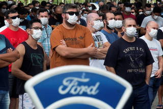 Workers attend a general meeting at Ford Motor Co's plant in Taubate