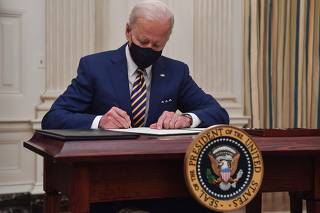 Biden signs executive orders for economic relief to Covid-hit families, businesses