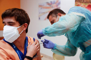 FILE PHOTO: Coronavirus disease vaccination in Madrid