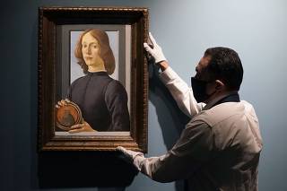 Auction at Sotheby's of Botticelli's 'Portrait of a Young Man Holding a Roundel'