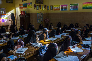 A class at Al Fatah Islamic Boarding School in Temboro, Indonesia, where girls as young as 5 are required to wear the niqab, Nov. 26, 2019. (Minzayar Oo/The New York Times)