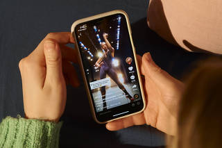 A TikTok by Harper Watters, @theharperwatters, a Houston Ballet soloist, plays on a phone in New York, Jan. 26, 2021. (Yael Malka/The New York Times)