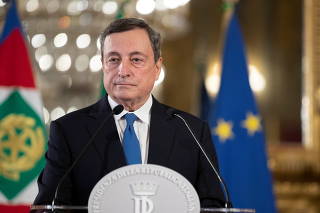 Former European Central Bank President Mario Draghi pauses as he speaks after his meeting with Italian President Sergio Mattarella in Rome