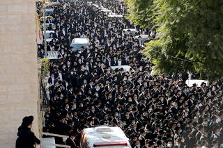 Ultra Orthodox Jews attend rabbi funeral amid COVID-19 restrictions