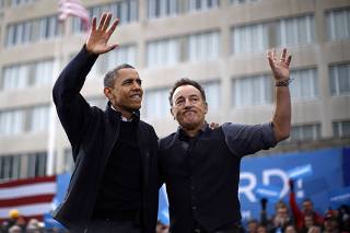 U.S. President Barack Obama is pictured with Bruce Springsteen during an election campaign rally in Madison