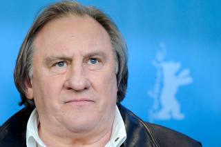 FILE PHOTO: Actor Depardieu poses during photocall at 66th Berlinale International Film Festival in Berlin
