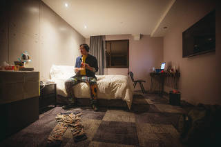 Pete Lee, a San Francisco-based filmmaker, directs a shoot in Austin, Texas, over Zoom at 4 a.m. one morning while in quarantine at the Roaders Hotel in Taipei, Taiwan. (Pete Lee via The New York Times)