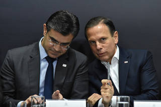 O vice-governador de SP, Rodrigo Garcia, ao lado de João Doria